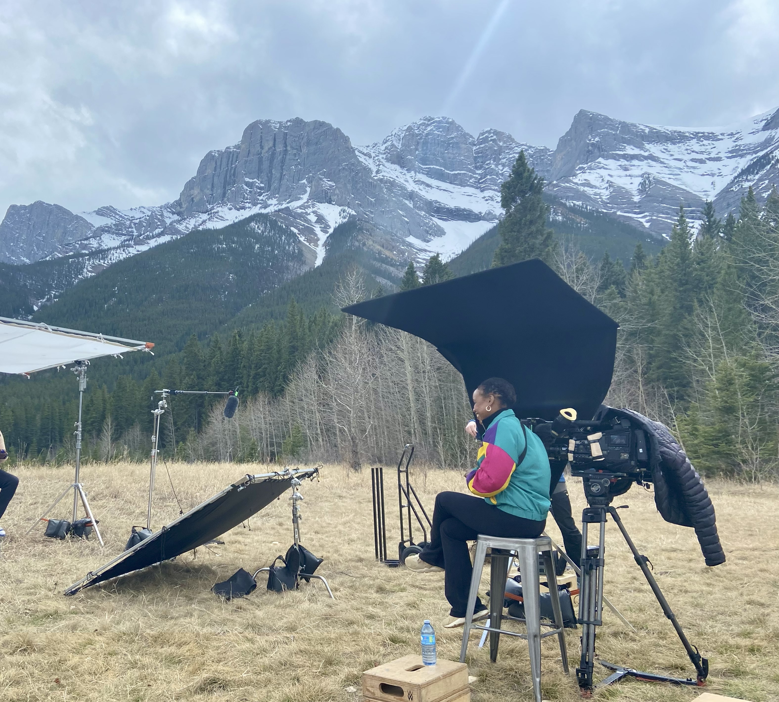 TV Producer and Director, Camille Lawrence, on a film set in the mountains