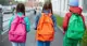 Kids walking to school with their school bags