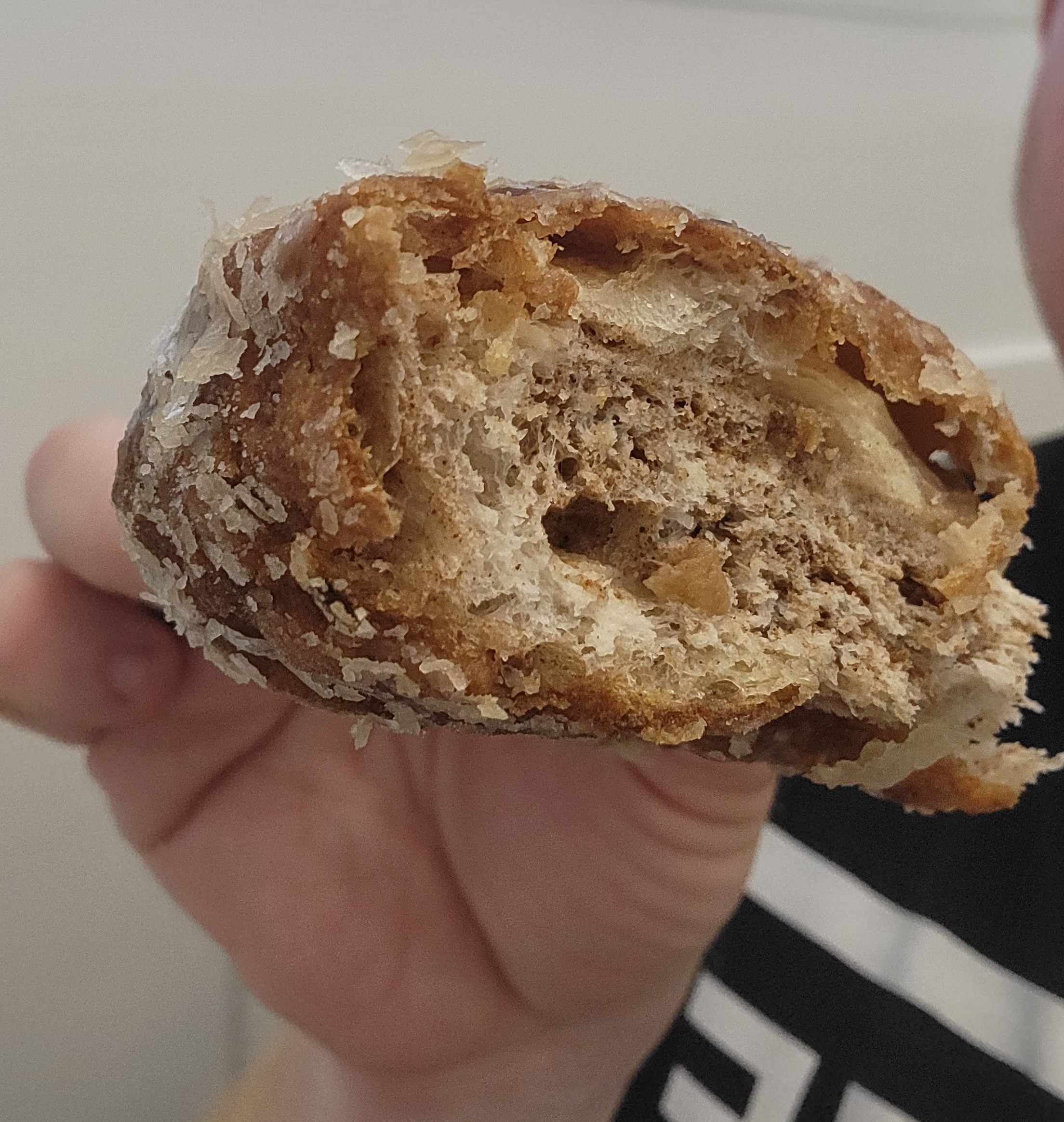 Hanks Pastries apple fritter Hanks Pastries apple fritter cut in half