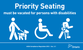 A blue priority seating sign