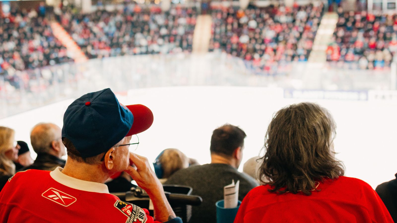 Image of a crowd wearing jerseys watching an Oshawa Generals hockey game