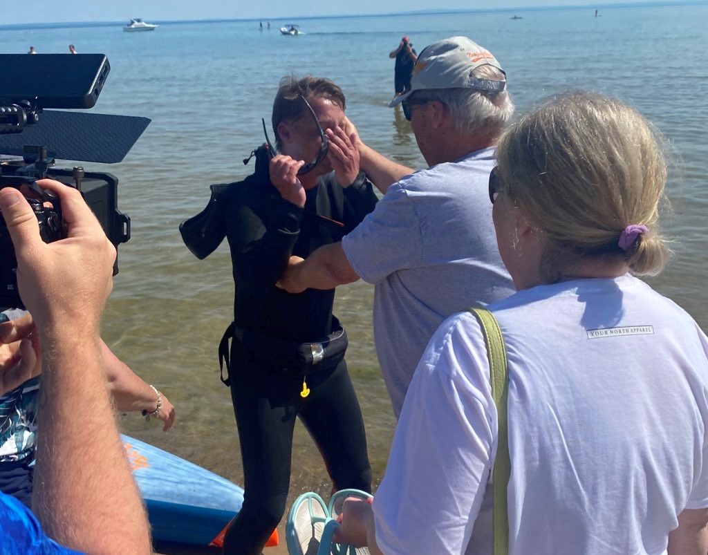 Mike Shoreman arrives on shore Mike Shoreman arriving on shore surrounded by cameras